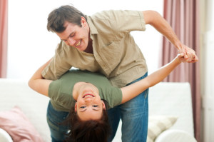 Happy young couple dancing